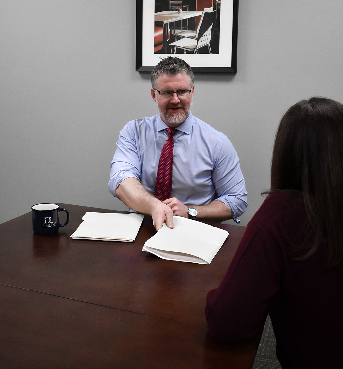 Lawyer Tyler Dihle with client